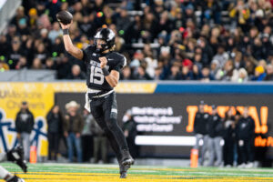WVU football coach Rich Rodriguez dealing with a unique situation at quarterback